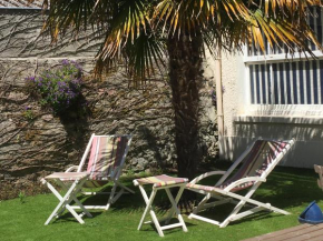 Maison entre page et port